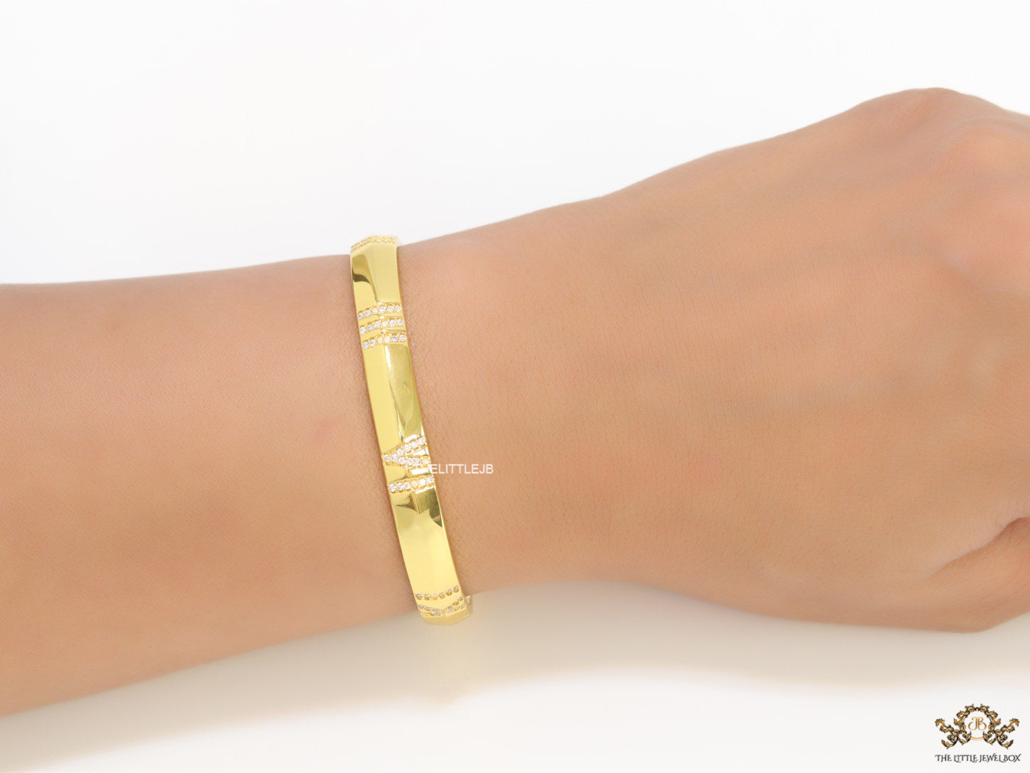 Gold bracelet with cz roman numerals