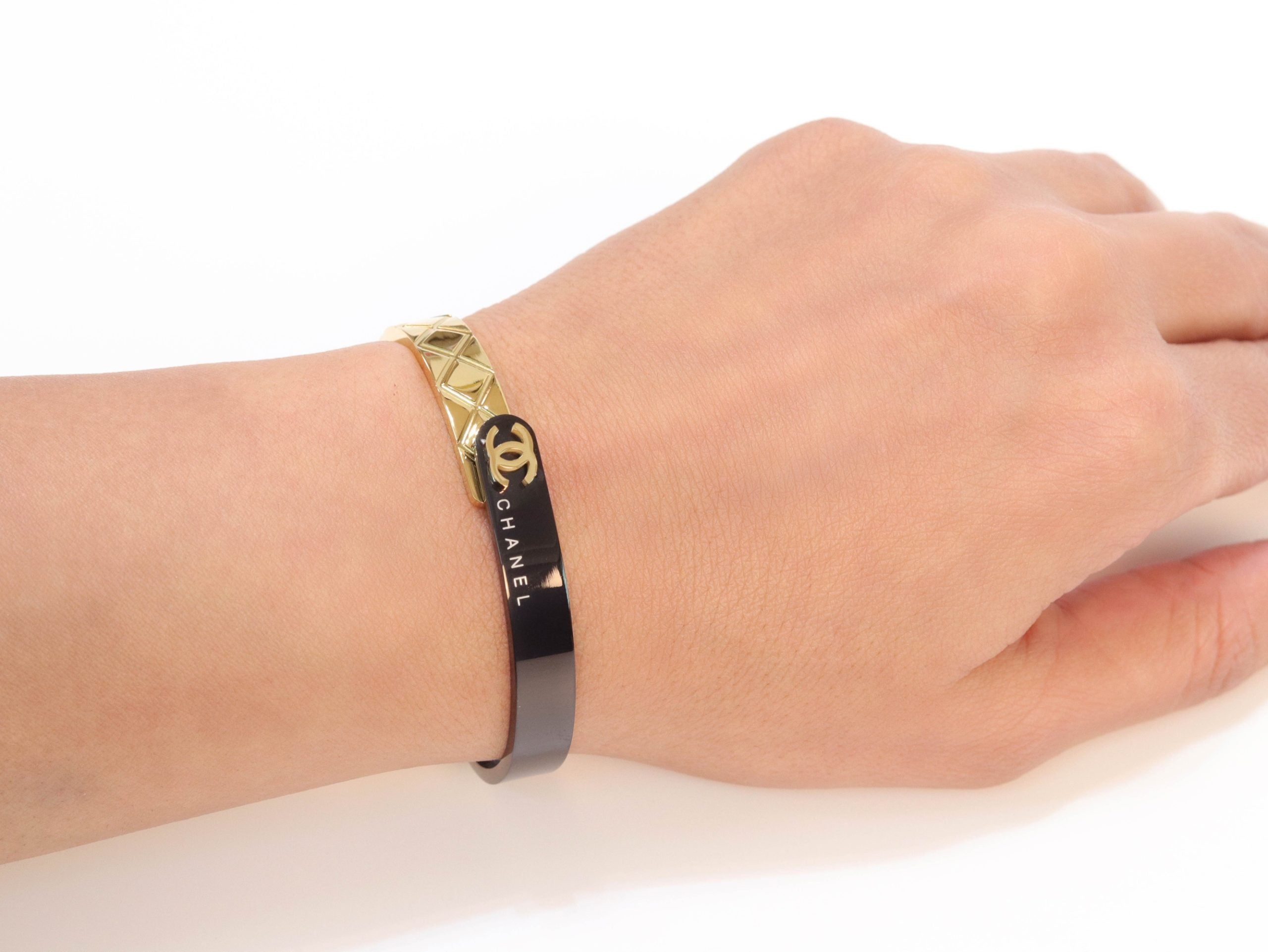 Half n Half gold black cross band style bracelet
