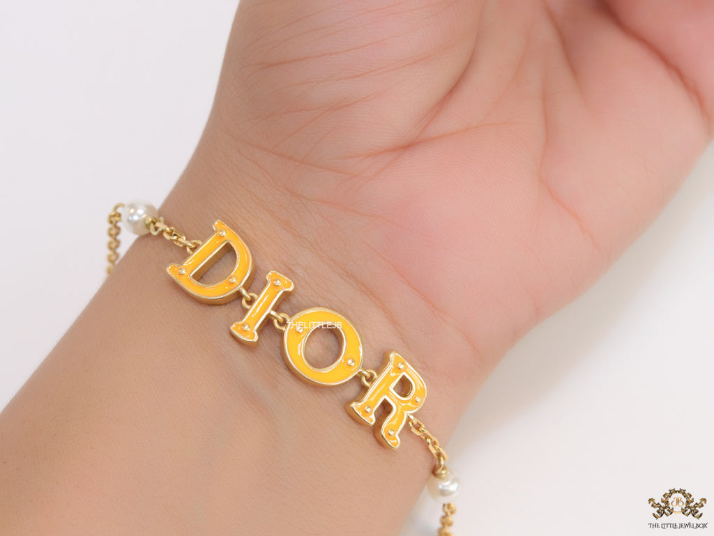 Alphabet bracelet with gold plated chain