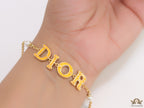 Alphabet bracelet with gold plated chain