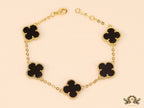 Gold plated chain bracelet with black clover