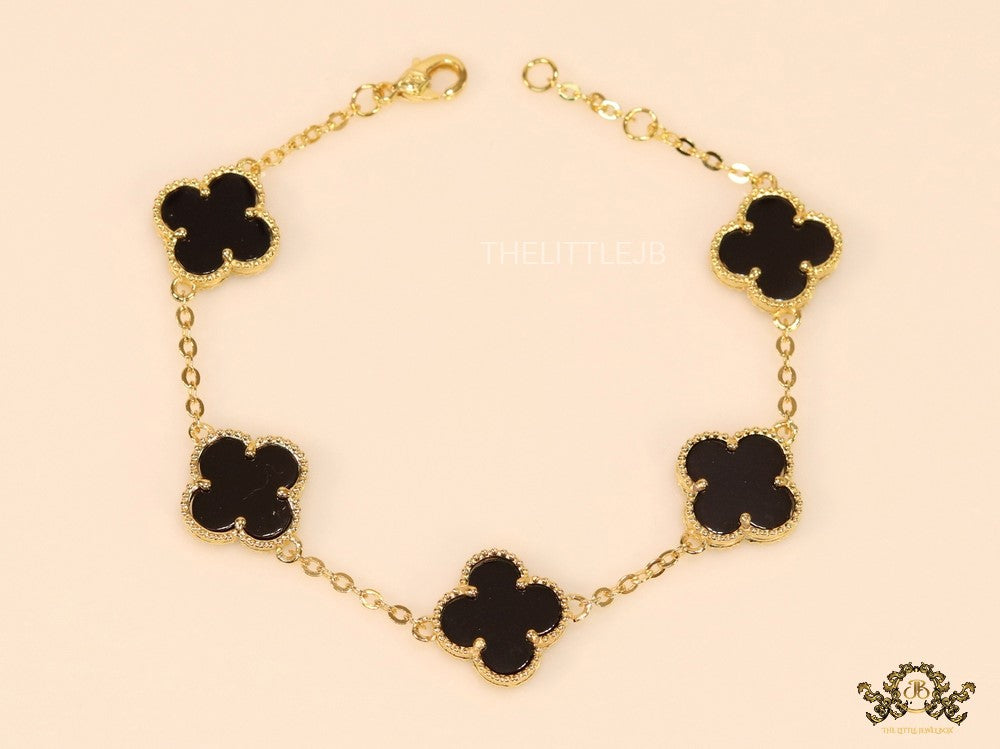 Gold plated chain bracelet with black clover
