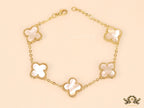 Gold plated chain bracelet with mother of pearl clover