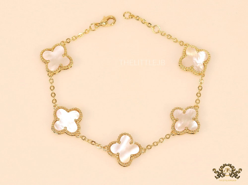 Gold plated chain bracelet with mother of pearl clover