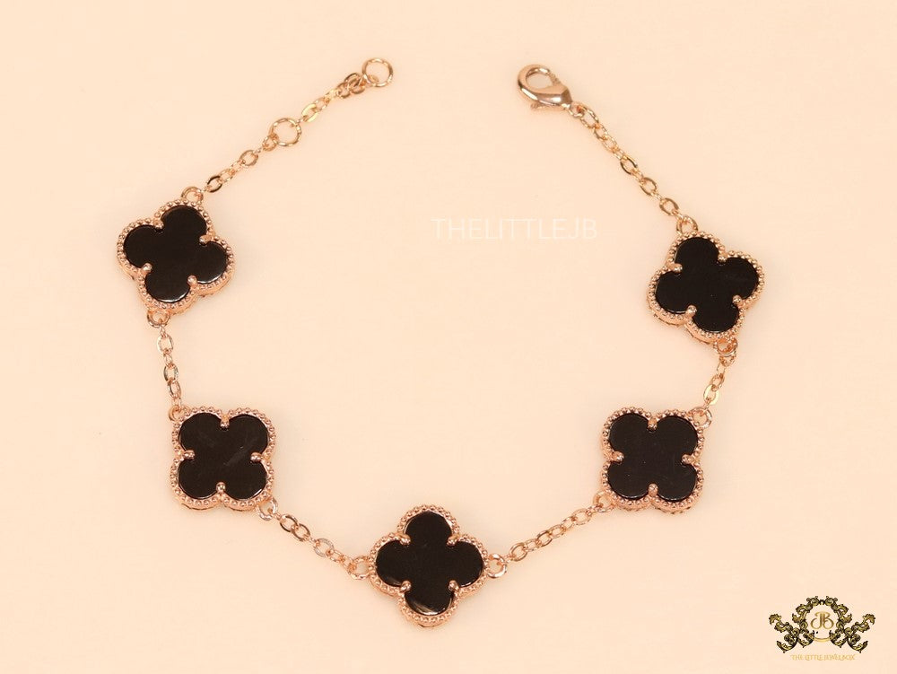 Rose gold plated chain bracelet with black clover