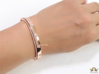 Rose gold bracelet with cz hearts and single line cz