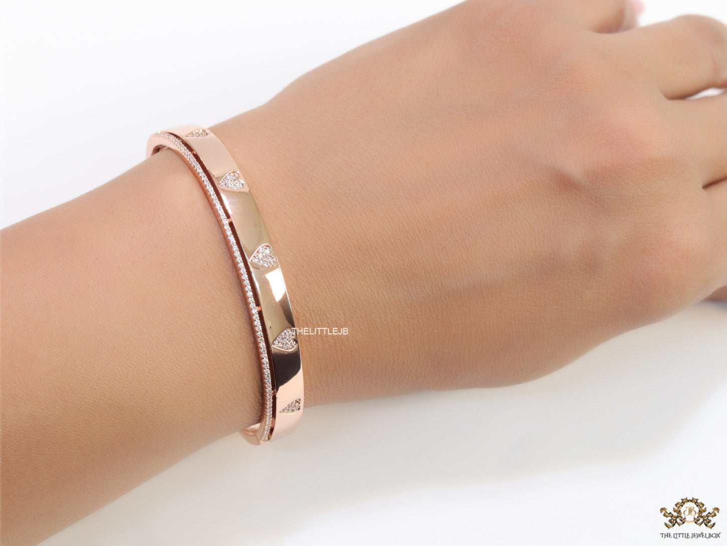Rose gold bracelet with cz hearts and single line cz