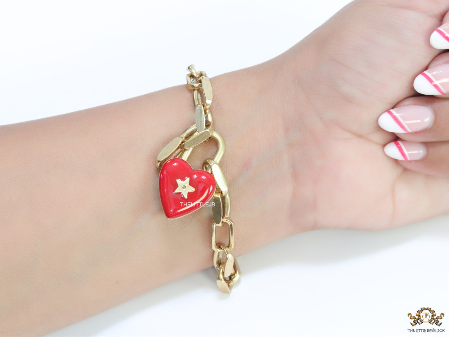 Gold plated link chain bracelet with heart shape lock