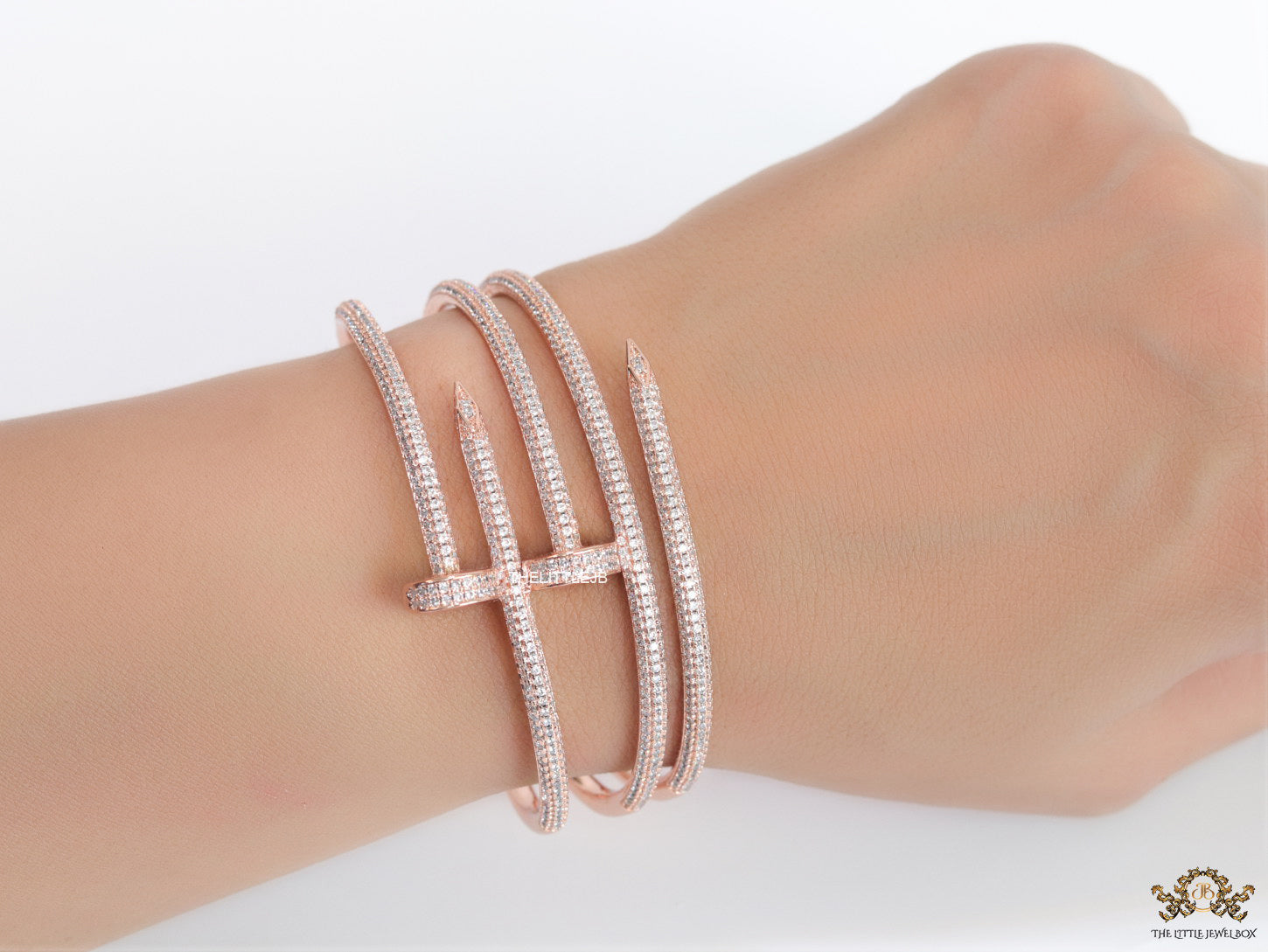 Rose gold plated twin nail bracelet with cz
