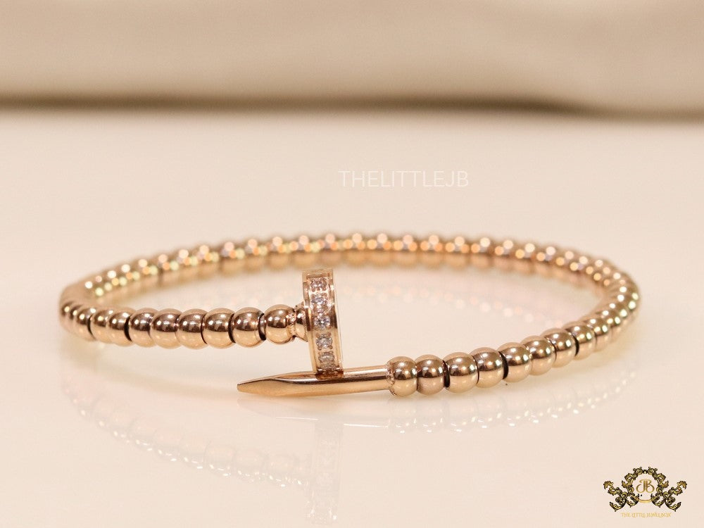 Rose gold plated cz and metallic bead nail bracelet-openable