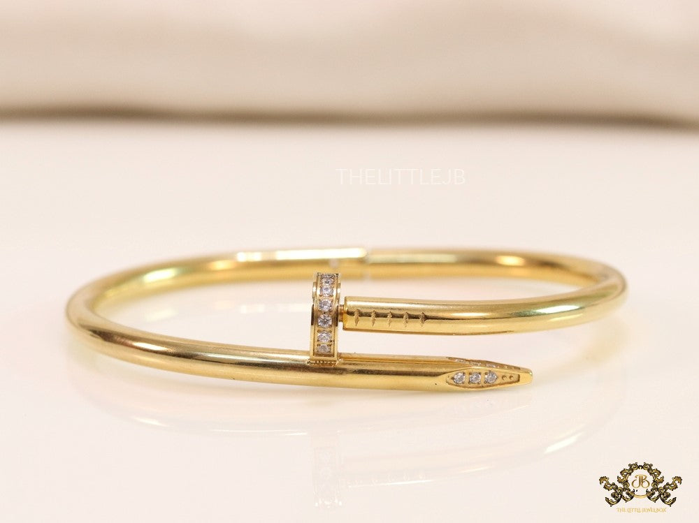 Gold plated nail bracelet with cz