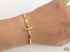 Gold plated bracelet with T motif centre