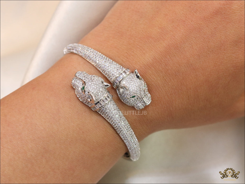 Platinum plated cz twin panther openable bracelet