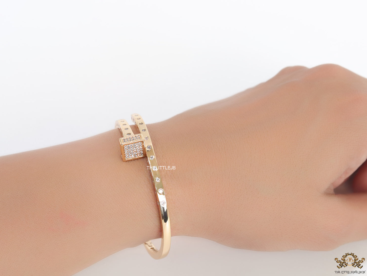Golden cz bracelet with cz head