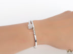 Platinum plated cz bracelet with cz head