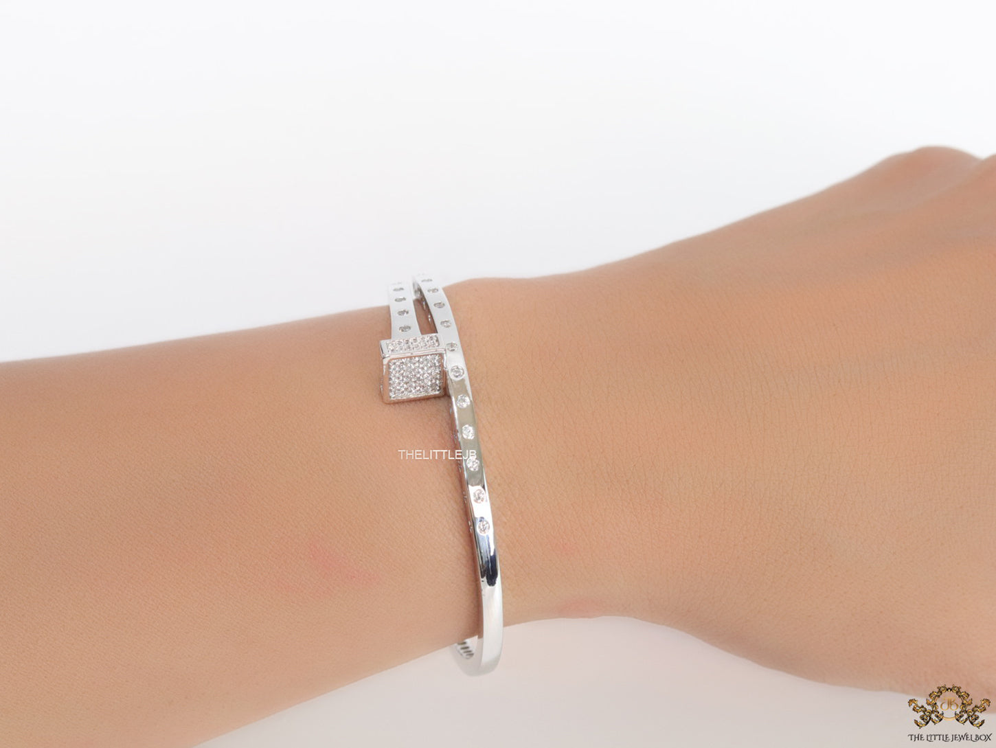Platinum plated cz bracelet with cz head