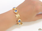 Designer golden Medusa chain bracelet with fancy cut cz