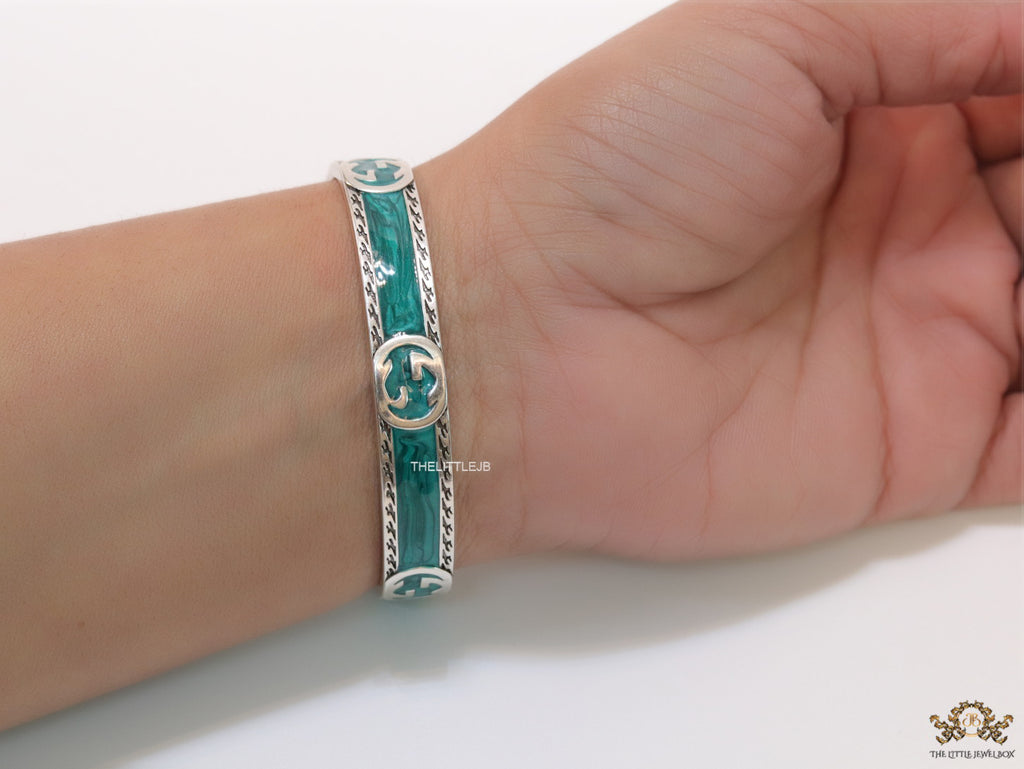 Twin G motif malachite green bracelet in matt gold finish