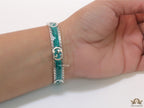 Twin G motif malachite green bracelet in matt gold finish