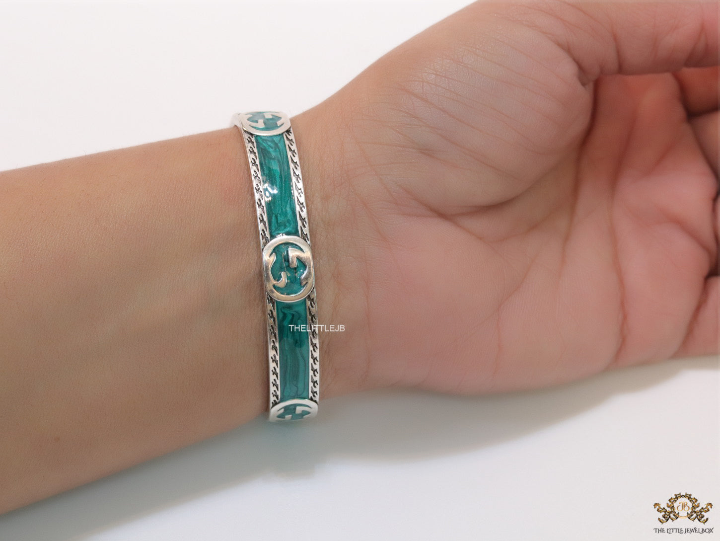 Twin G motif malachite green bracelet in matt gold finish
