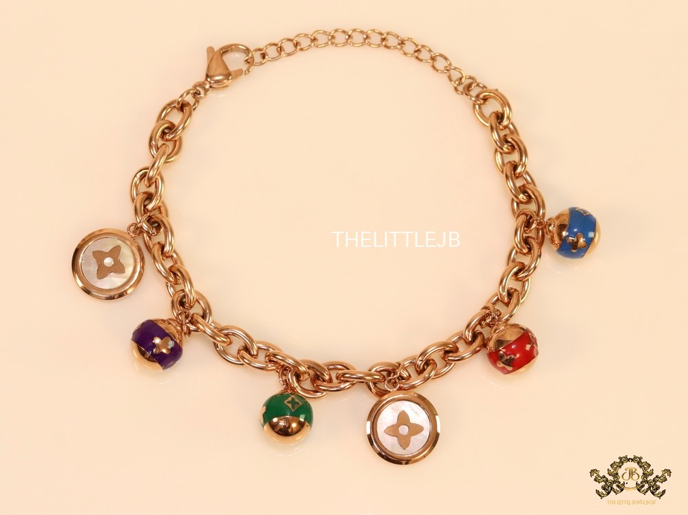 Rose gold plated link chain bracelet with multi enamel and MOP charms