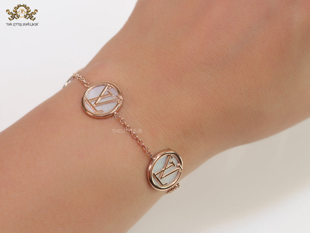 Rose gold plated sleek chain bracelet with MOP discs