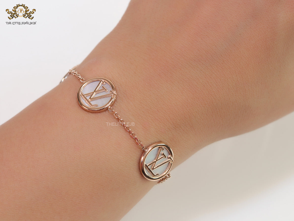 Rose gold plated sleek chain bracelet with MOP discs