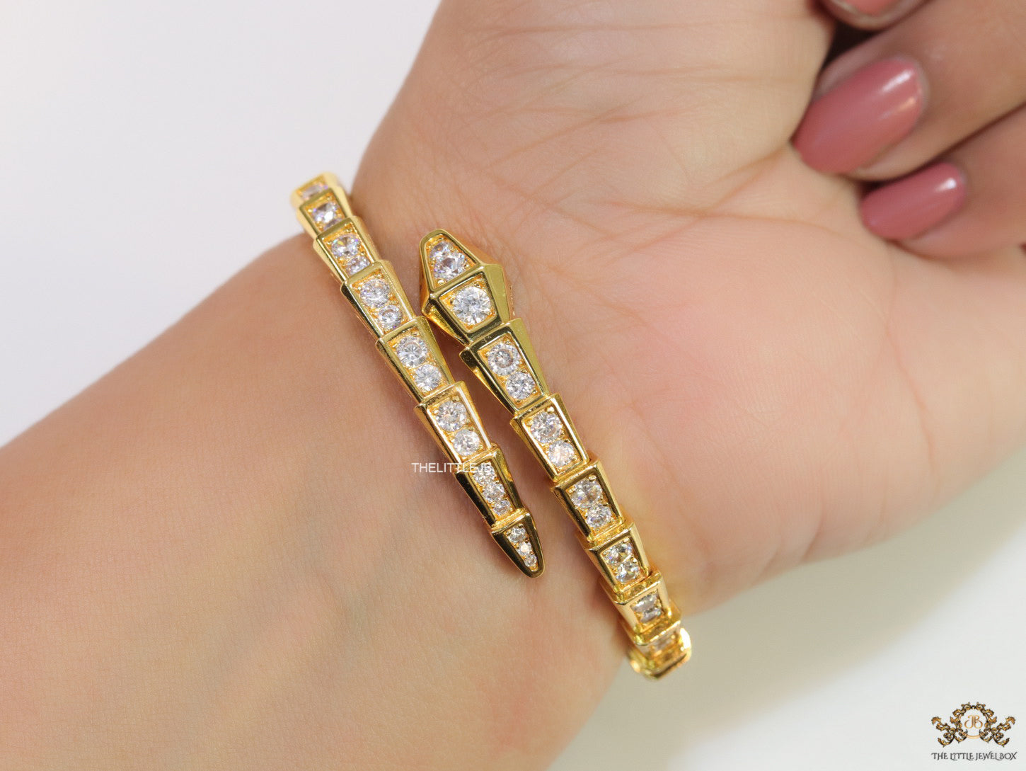Gold plated open cz serpent bracelet
