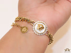 Golden link chain bracelet with Medusa motif centre