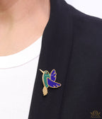 Gold plated multi-colour flying bird brooch