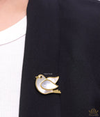 Gold plated white bird brooch