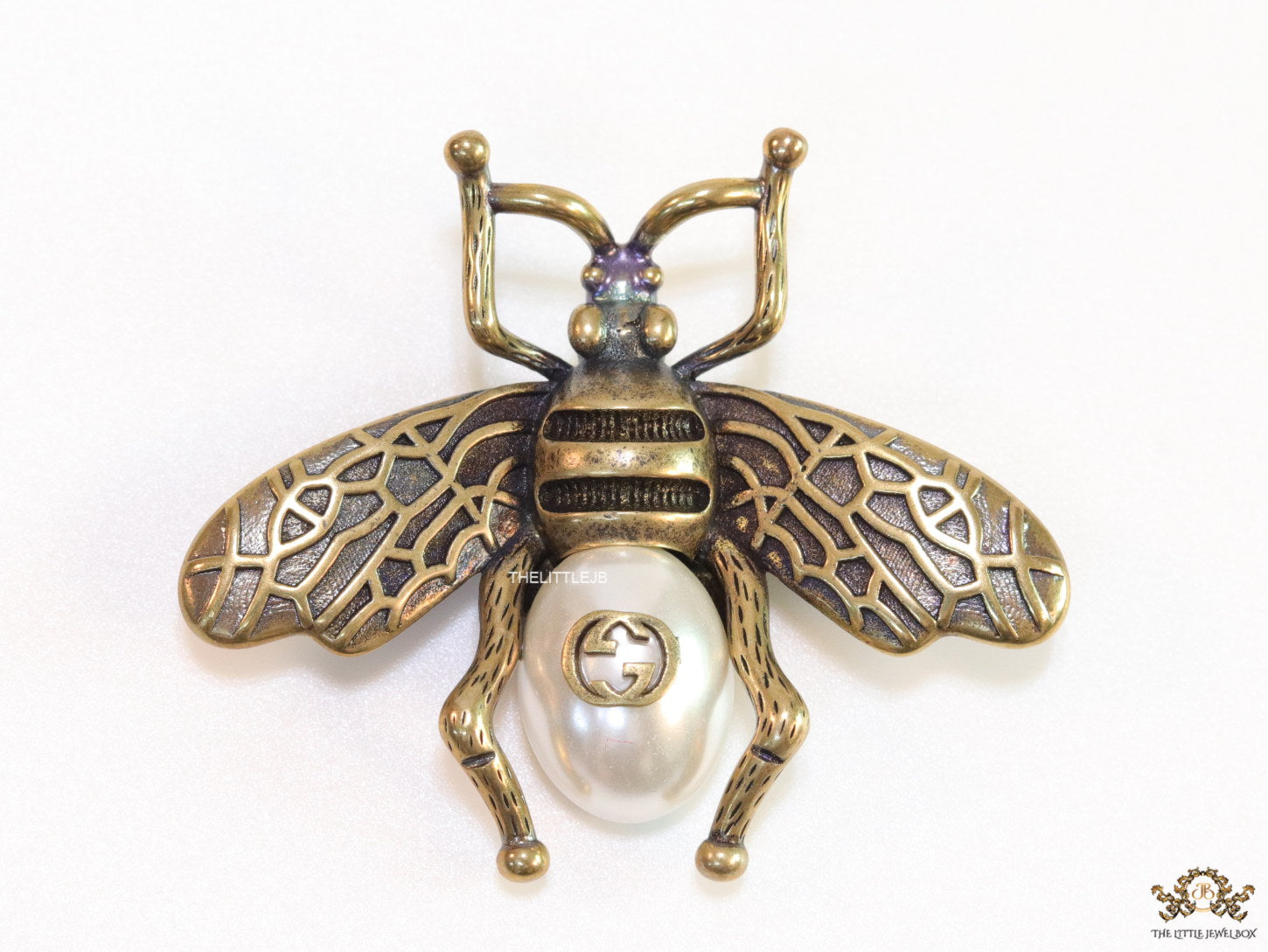 Antique gold finish alphabet bee brooch
