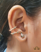 Rose gold plated ear cuff pattern serpentine earrings with green cz