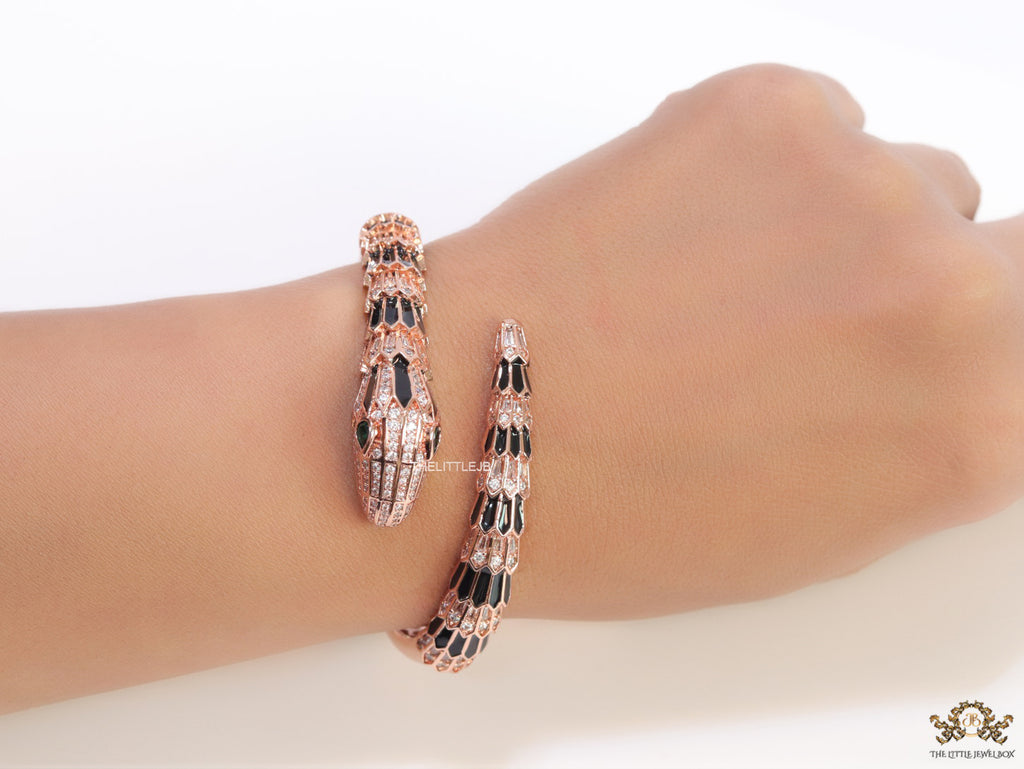 Top open serpentine black enamel bracelet with rose gold plating and cubic zirconia stones