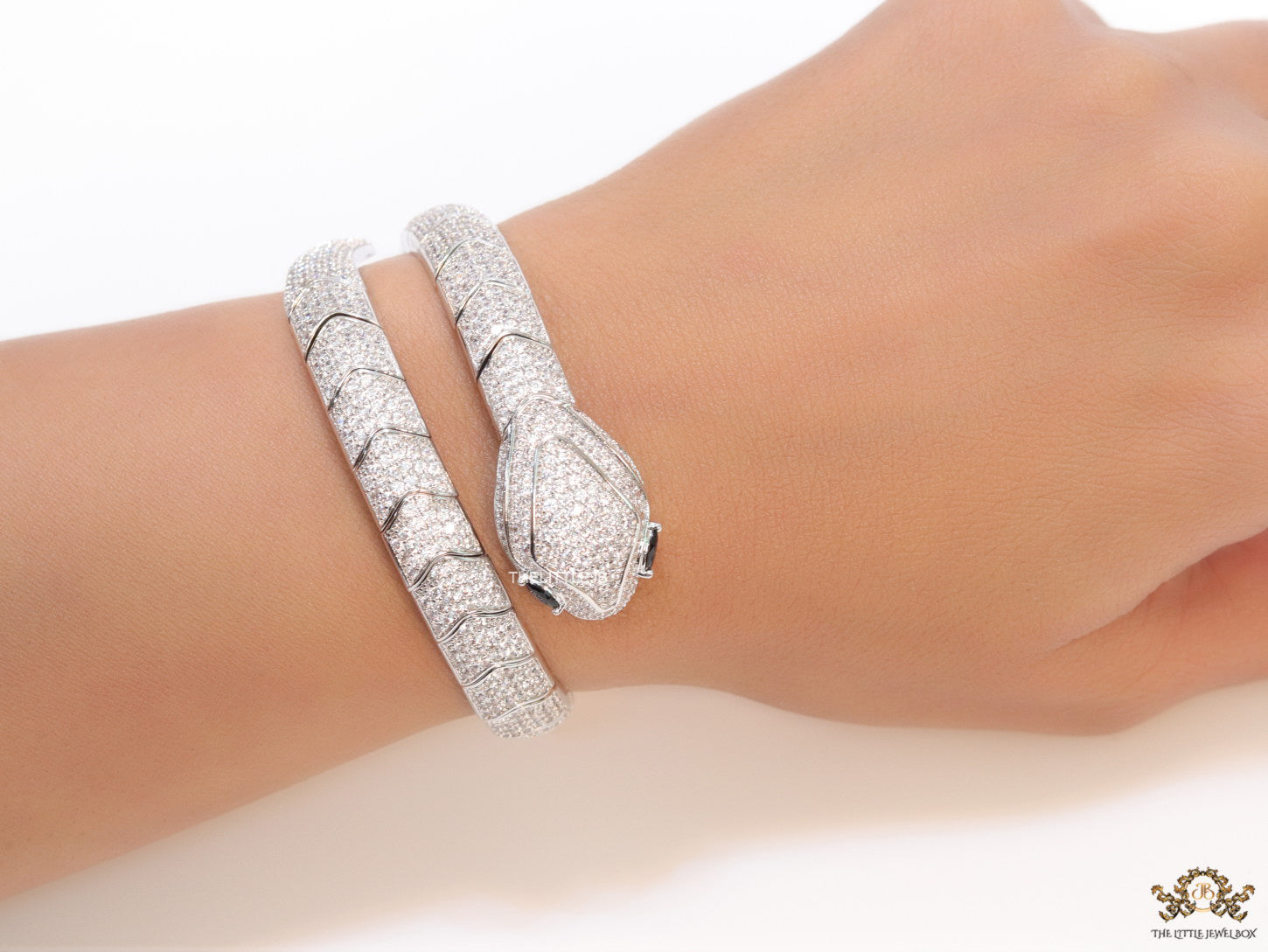 Cubic zirconia stones serpentine bracelet with platinum plated details black cubic zirconia stone details