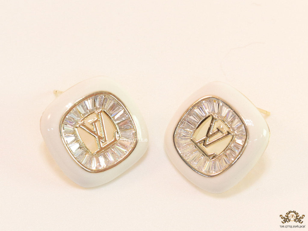Golden and white square studs with alphabets and cz baguettes
