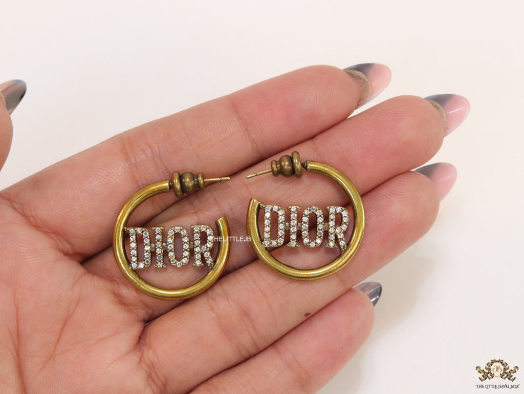 Open golden hoops with cz alphabets