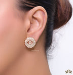 Round gold studs lined with cz baguettes and twin C cz motif centre