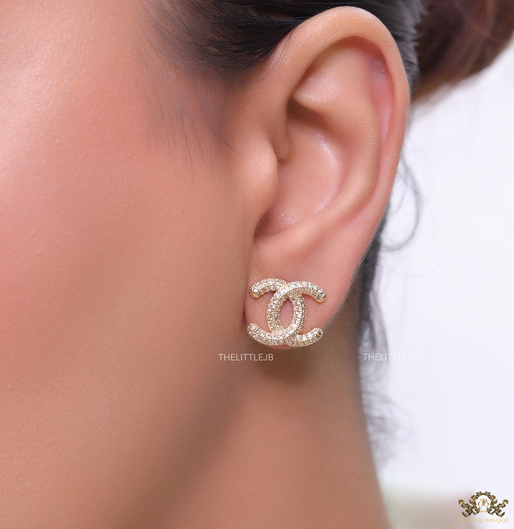 Gold plated twin C motif studs with cz