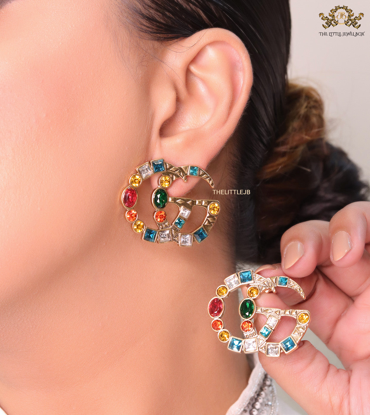 Double G golden earrings with multicolor cz stones