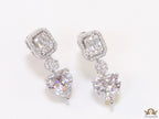 Cz baguette earrings in platinum with heart shape cz drop