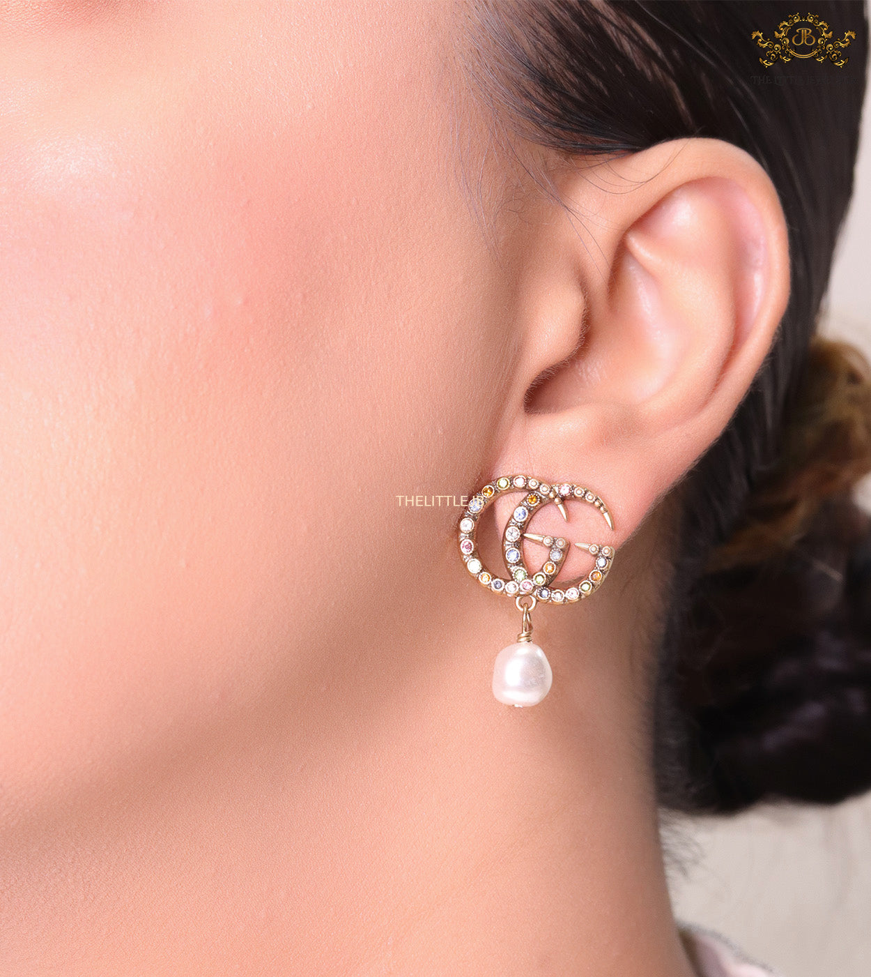 Double G golden earrings with multi color cz stones and pearl