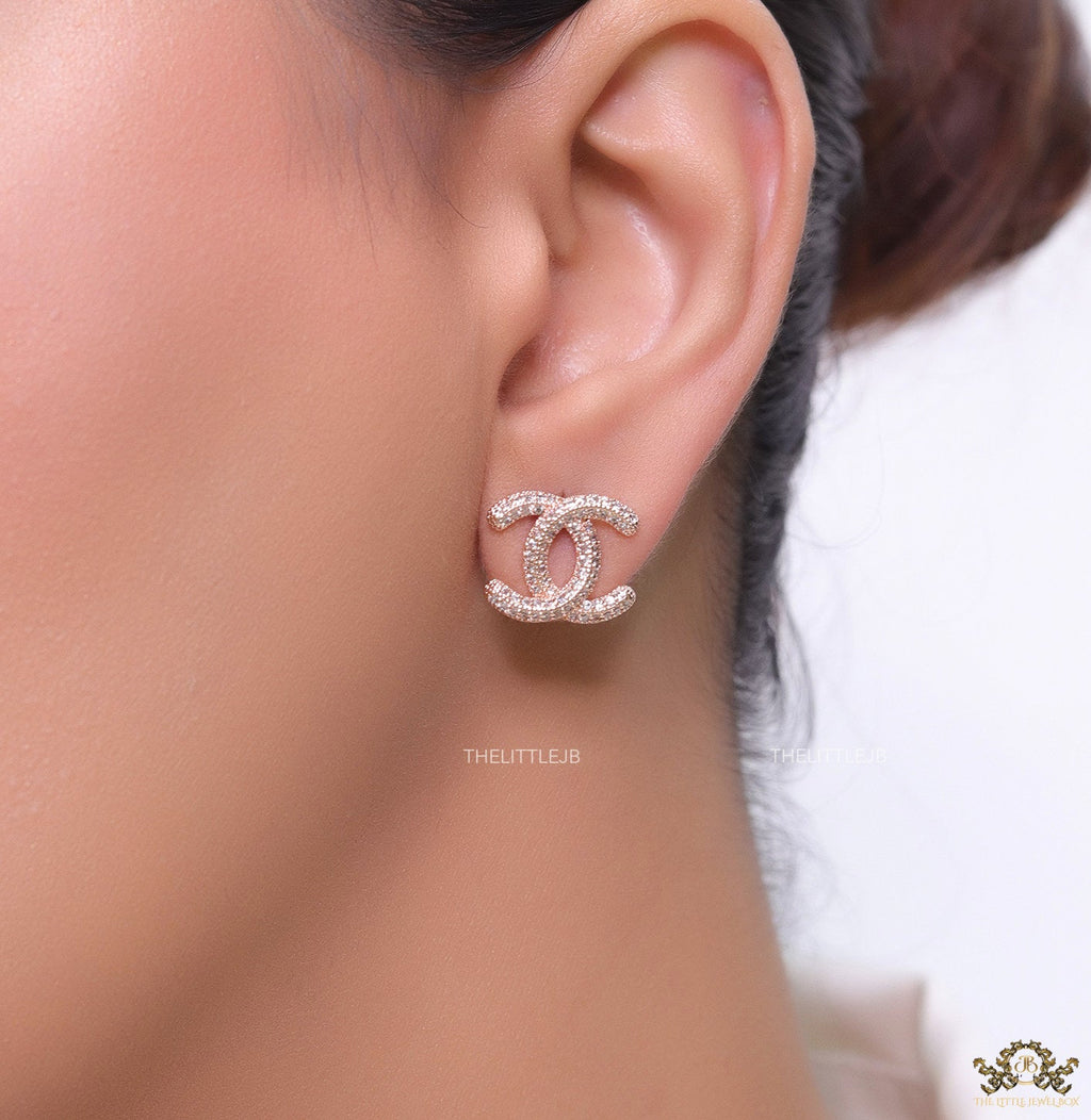 Rose gold plated twin C motif studs with cz