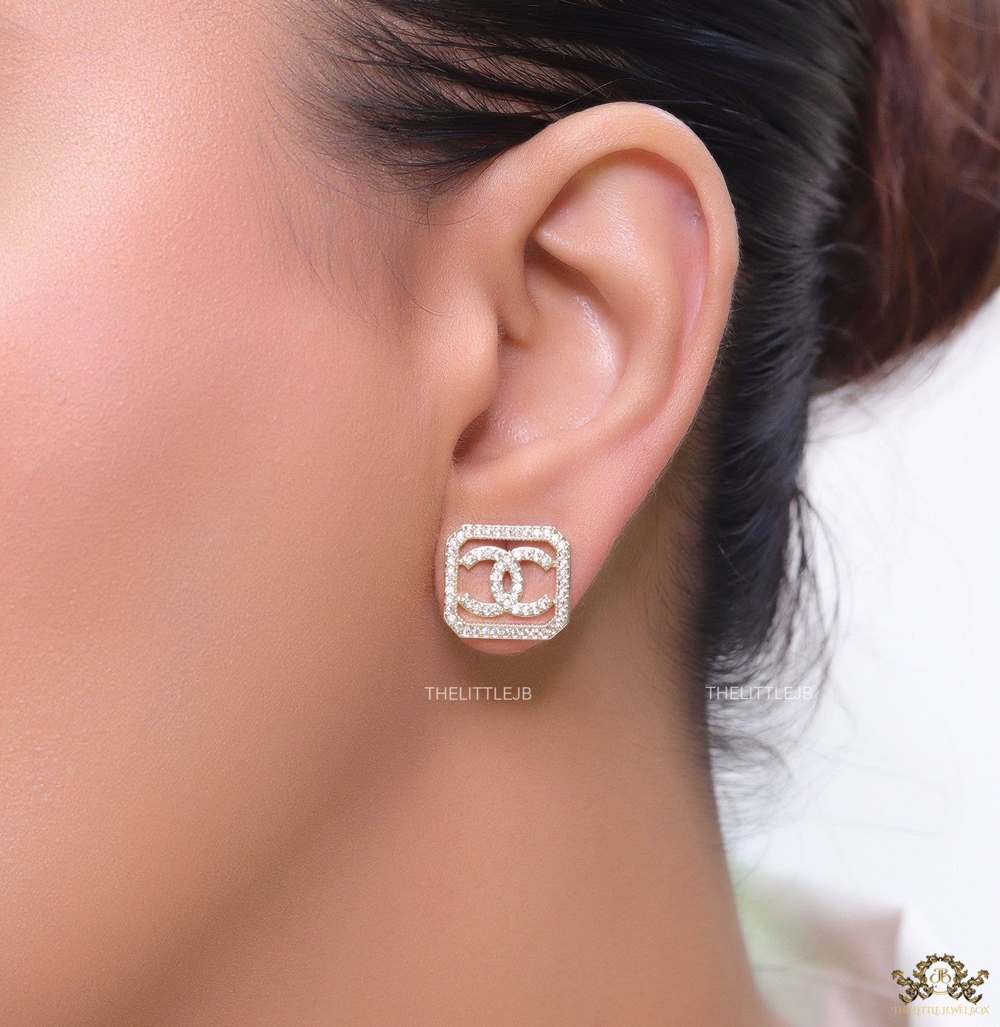 Gold plated square cz stud with twin C motif