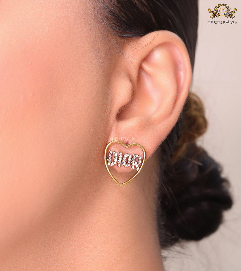 Matt gold plated heart shaped earrings with cz alphabets