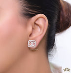 Platinum plated square cz stud with twin C motif