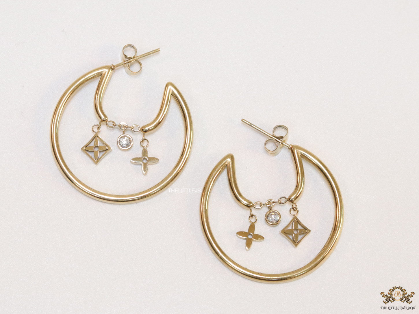 Designer golden hoops with various charms
