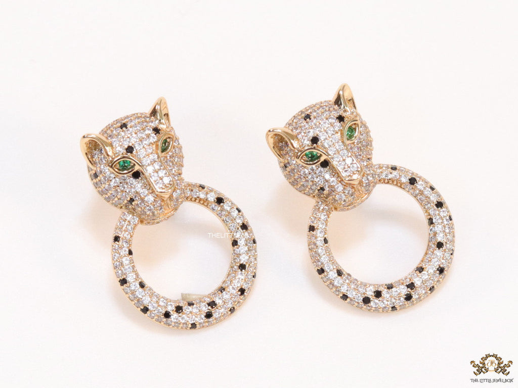 Cz panther face with ring studs in golden finish