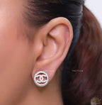 Round platinum studs lined with cz and twin C motif centre