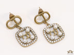 Antique gold plated alphabet motif studs with cubic zirconia stones, white pearl and alphabets